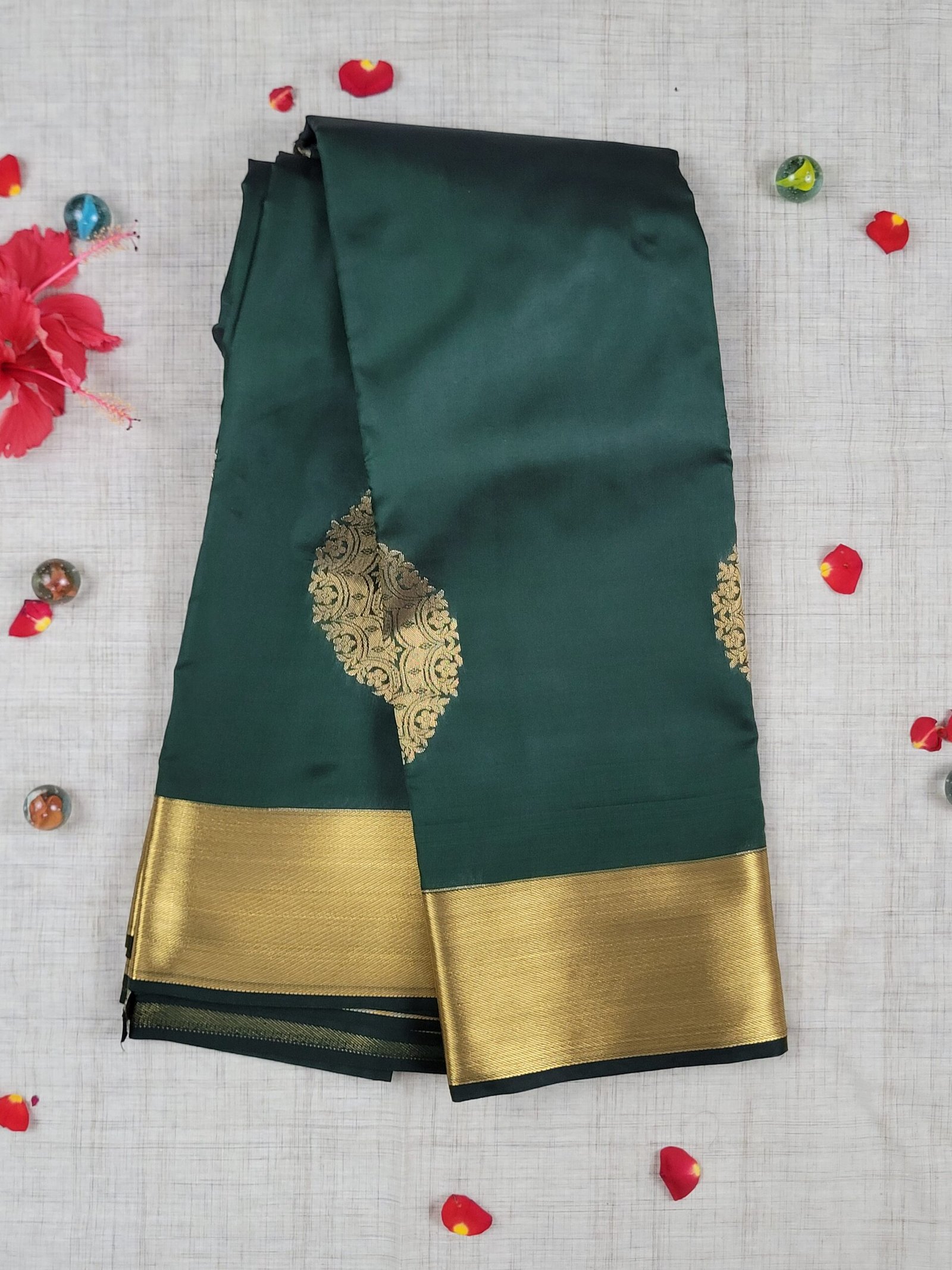 Vasthrakala – Emerald Elegance with Gold Zari Saree